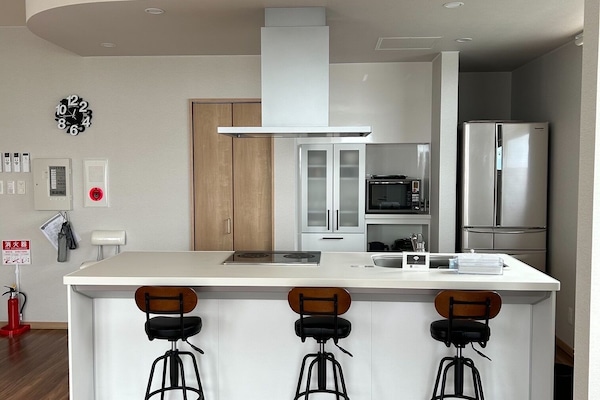 Comfort Villa | Private kitchen | Full-size fridge, microwave, oven, stovetop