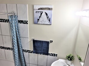 Hair dryer, towels, soap, shampoo
