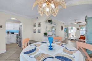View from dining area to the kitchen and the living room - Close to Beach! Free Activities! ~ 107F Barefoot (Indian Shores)