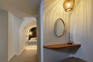 Grand Suite, 2 Bedrooms, Jetted Tub, Partial Sea View | Minibar, in-room safe, individually decorated, individually furnished