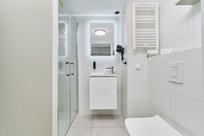 Shower, hair dryer, towels, shampoo - Sunny Studio | Air Conditioning, Parking, Close to Airport (Wroclaw)