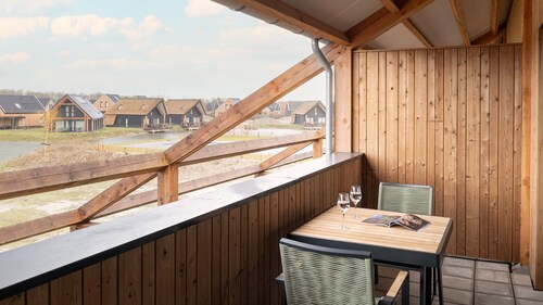 Chambre d’hôtel confortable avec vue sur l’eau
