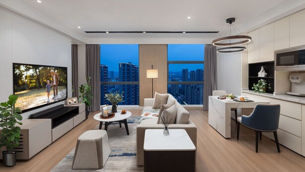 A modern living room with a flat-screen TV, comfortable seating, a dining area, and a view of the cityscape. - Somerset Taihu New City CBD Wuxi (Wuxi)