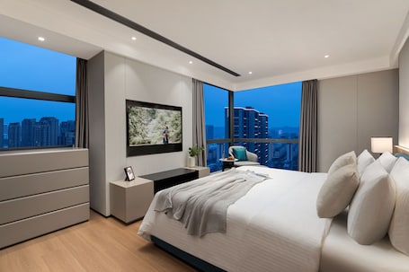 Down comforters, free minibar, in-room safe, desk