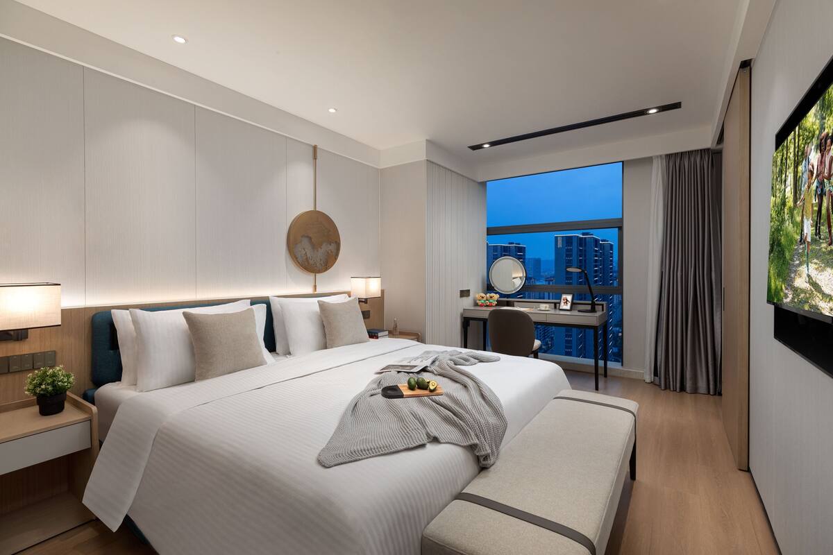 ดีลักซ์อพาร์ทเมนท์, 1 ห้องนอน | ผ้านวมขนเป็ด, มินิบาร์ฟรี, ตู้นิรภัยในห้องพัก, โต๊ะทำงาน