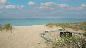 On the beach, sun loungers, beach towels