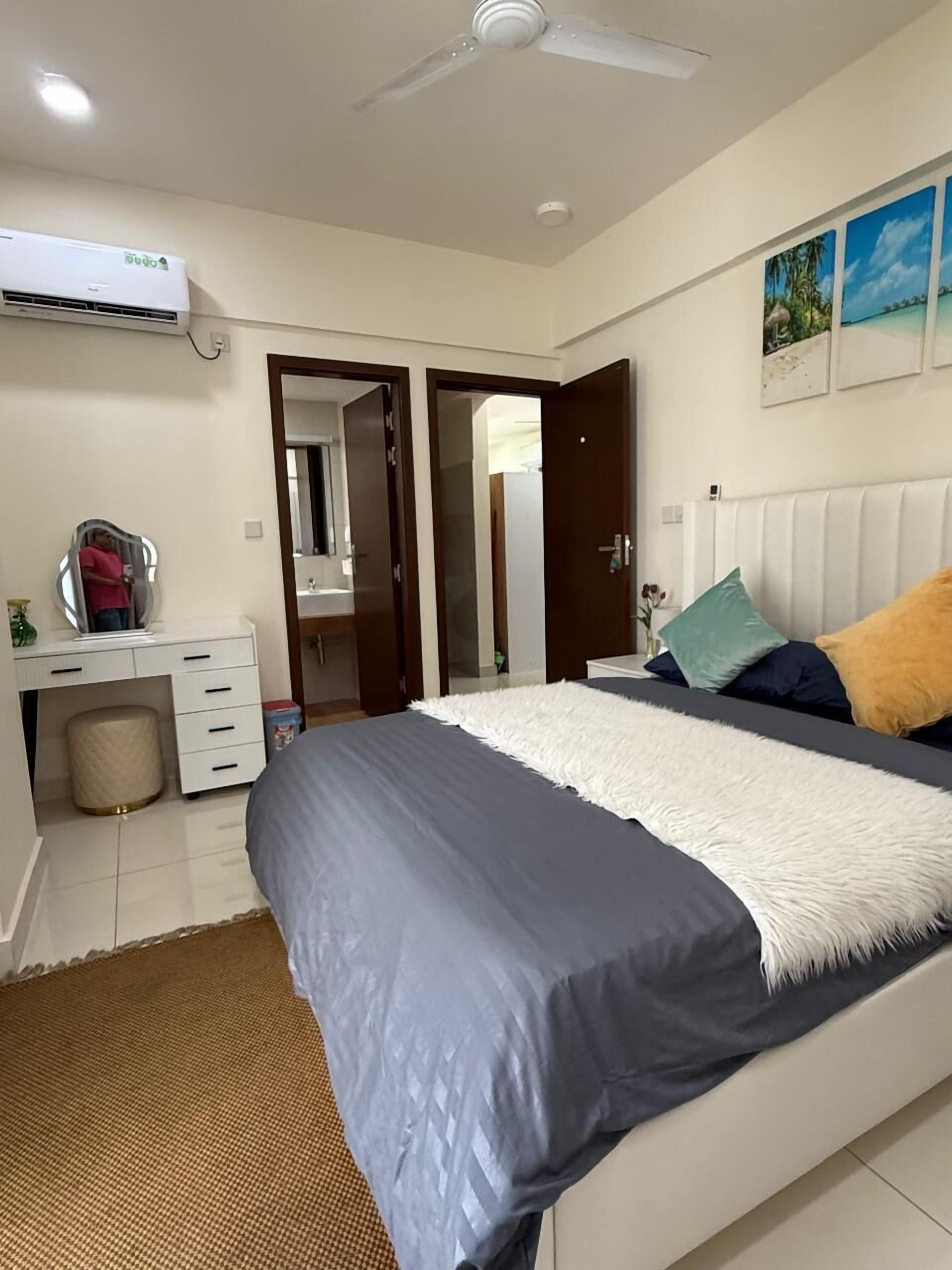 Deluxe Apartment, City View, Tower | Living area | 45-inch LCD TV with cable channels, TV