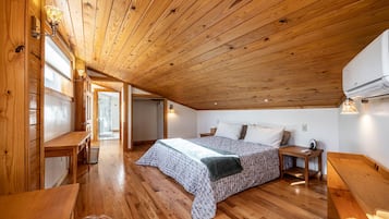 1 slaapkamer, een strijkplank/strijkijzer, beddengoed