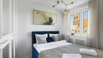 Deluxe-Apartment | Wohnbereich | Flachbildfernseher