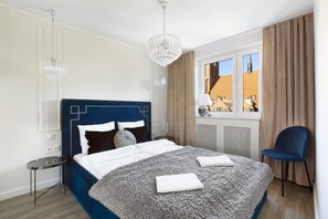 Leilighet – deluxe | Oppholdsområde | Flatskjerm-TV