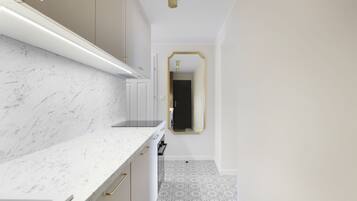 Deluxe Apartment | Living area | Flat-screen TV