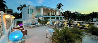 The entire property is a lush tropical paradise perfect for entertaining and relaxing.