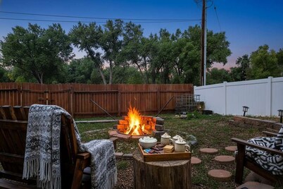 Charming 1910 Pet-Friendly Home in Sheridan, WY | Huge Fenced Yard Steps From Dog Park | Updated Kitchen & Cozy Fire Pit | Walk to Downtown Dining & Bighorn Mountain Adventures | Ideal for Families & Fur Babies