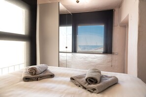 1 habitación, tabla de planchar con plancha, wifi gratis y ropa de cama 