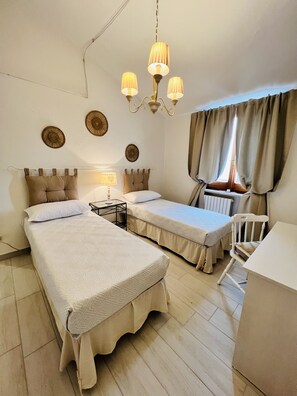 2 bedrooms, desk, iron/ironing board, travel crib