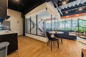 Departamento Deluxe | Área de sala de estar | Smart TV 