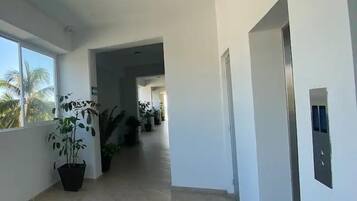 Comfort House | Living area | 35-inch TV with cable channels
