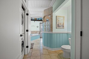 Shower, jetted tub, towels