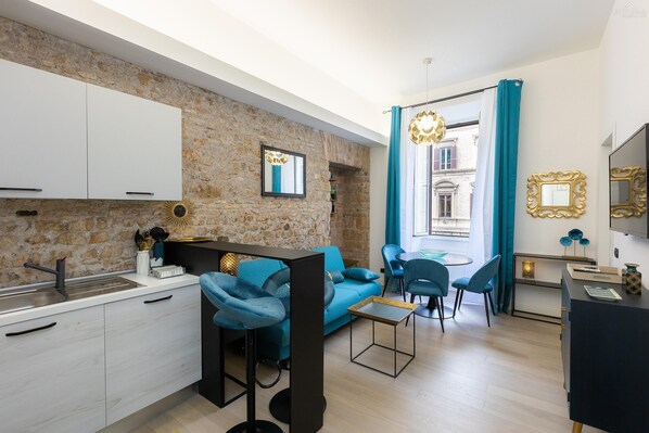 Fridge, microwave, stovetop, coffee/tea maker