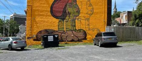 A large mural of a cartoon character on a building.