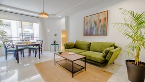 Luxury Apartment | Living area | 46-inch Smart TV with cable channels, TV - Stayhere Rabat - Agdal 1 - Comfort Residence (Rabat)