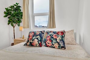 Departamento, varias camas | Área de sala de estar