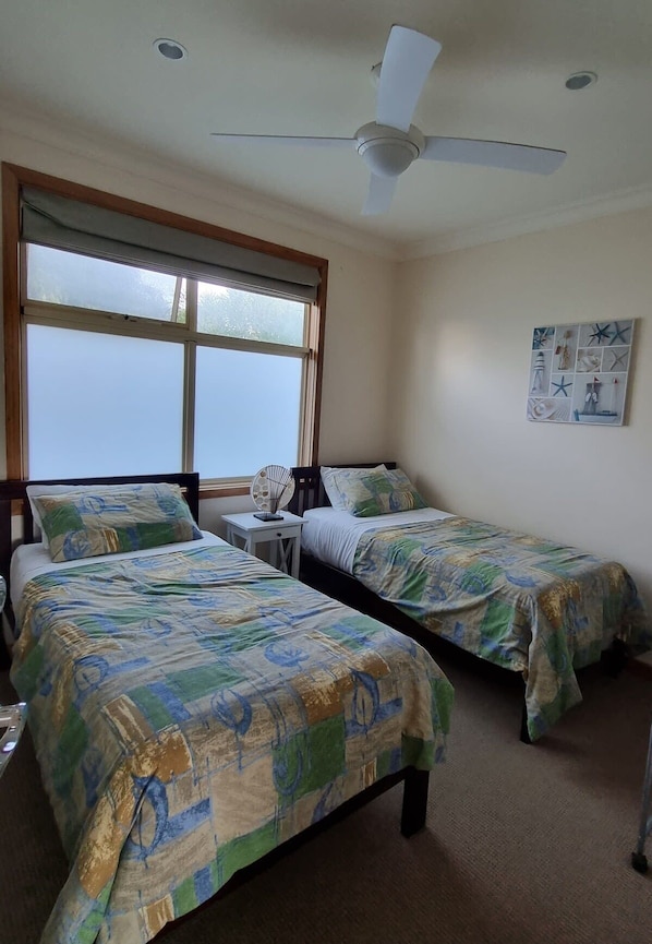 4 bedrooms, iron/ironing board, travel cot, WiFi