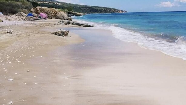 A beach with clear blue water, a sandy shore, and a mountain in the background. - Villa Delphia One Bedroom Traditional House (Kefalonia)