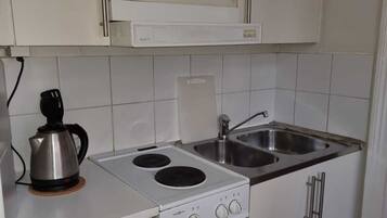 Apartamento, 3 camas de solteiro | Cozinha privada | Geladeira, micro-ondas, fogão, cooktop