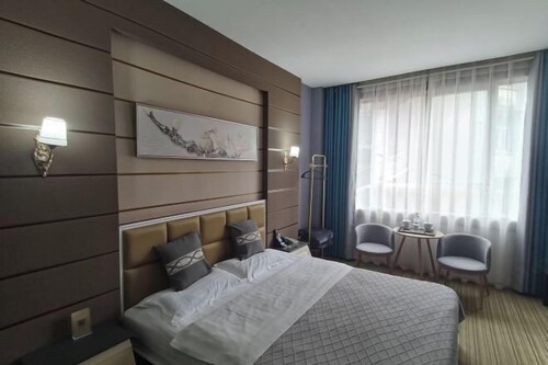 Shehong Hexie Business Hotel