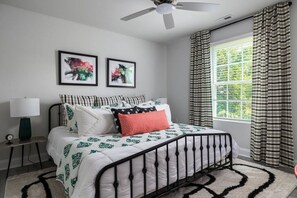 4 bedrooms, desk, iron/ironing board, travel cot