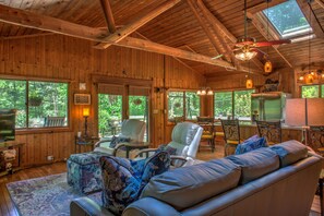 Smart TV, fireplace, books, printers