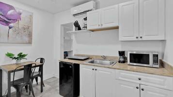 Microwave, stovetop, coffee/tea maker, toaster