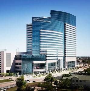 Located on the University of Texas campus, the MD Anderson Cancer Center features a striking glass facade and structured design.