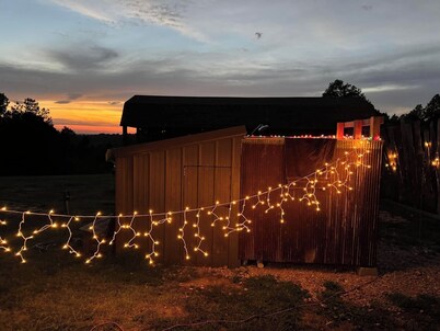 The Adventure Center rustic tiny cabin hot tub access stage stars sunsets & pets