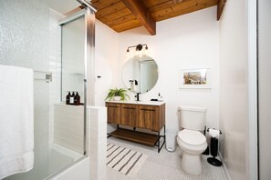 Combined shower/bathtub, hair dryer