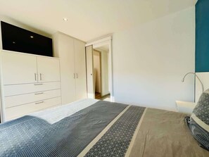 2 dormitorios, tabla de planchar con plancha, wifi gratis y ropa de cama