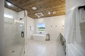 Bathtub, hair dryer, towels, soap