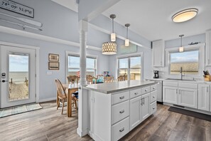 Fridge, microwave, oven, stovetop - Modern Oceanfront Cottage with Direct Beach Access & Near Pier (Oak Island)
