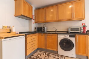 Fridge, microwave, coffee/tea maker, toaster