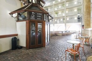 Relax in our cozy coffee shop area, offering hot coffee, cold drinks, and warm eats.