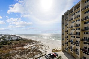 Enjoy stunning ocean views from the balcony of this high-rise building.