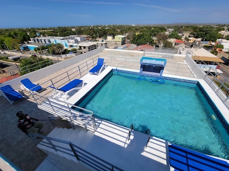 Outdoor pool, open 7:00 AM to 8:00 PM, sun loungers