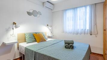 2 dormitorios, tabla de planchar con plancha, wifi gratis y ropa de cama