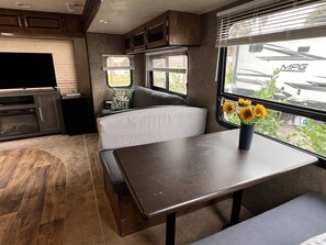 Living area - Escape to Coastal Bliss: Charming Downtown Jensen Beach Vacation Camper  (Jensen Beach)