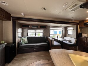 Interior - Escape to Coastal Bliss: Charming Downtown Jensen Beach Vacation Camper  (Jensen Beach)