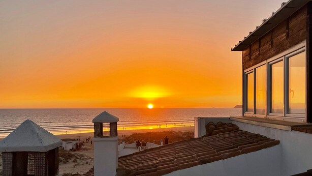 A sunset view from a building with a beach in the background. - The funny Tuna in Zahara de los Atunes (Zahara de los Atunes)