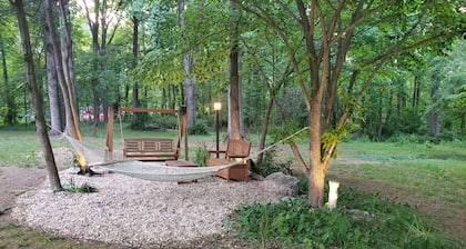 Class A RV on a private 5 Acre Property with RV campsite and trail.