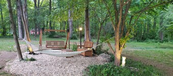 Class A RV on a private 5 Acre Property with RV campsite and trail.