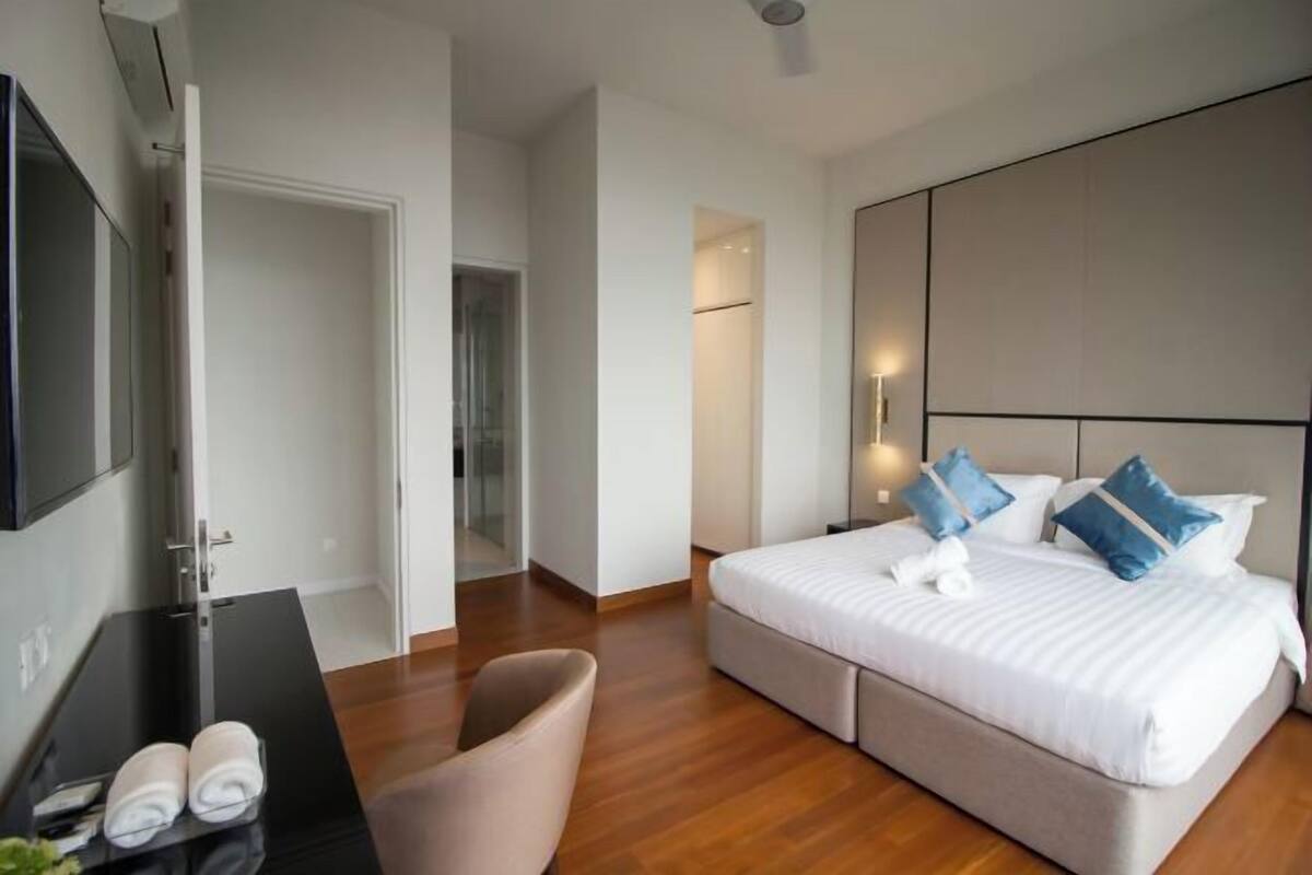 Premium bedding, desk, blackout drapes, iron/ironing board